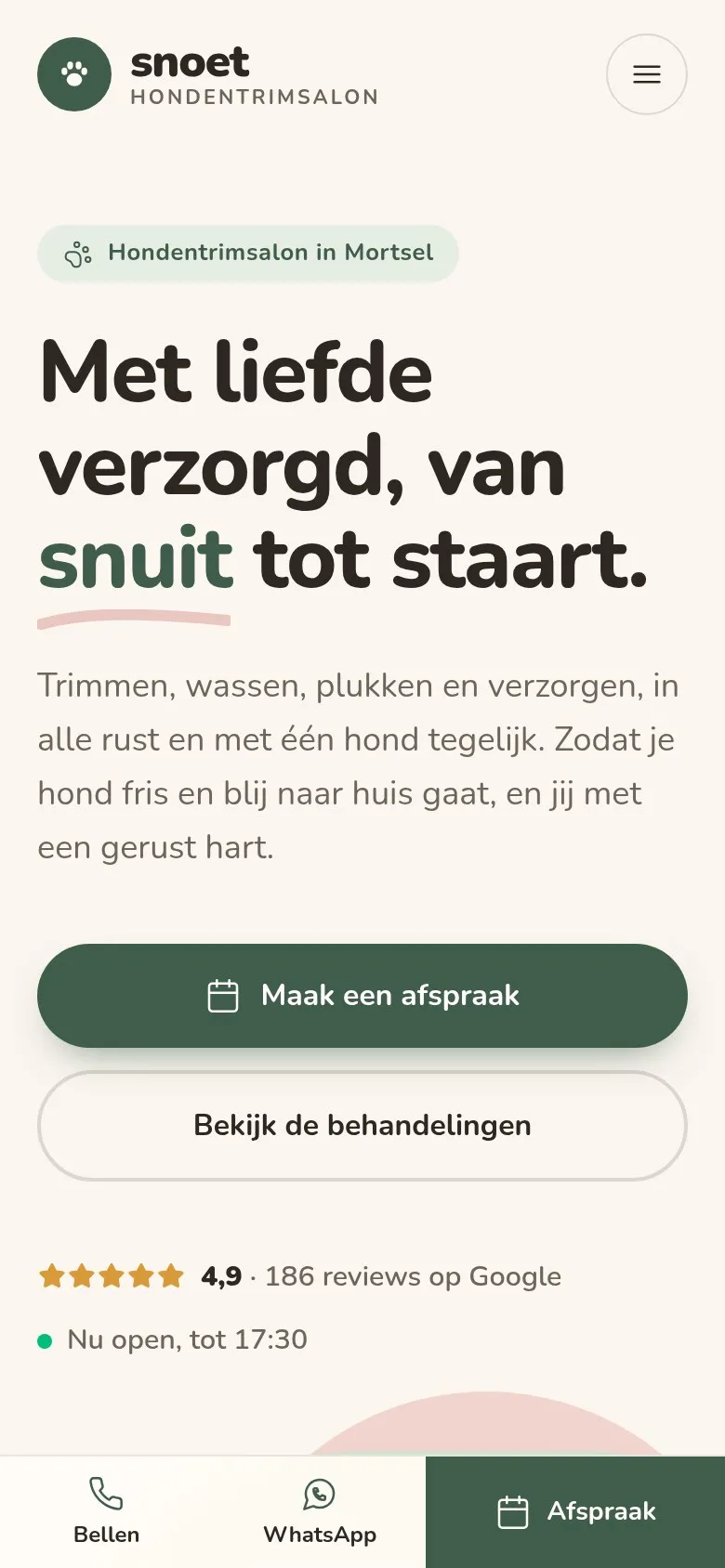 Homepage van Snoet hondentrimsalon op een gsm